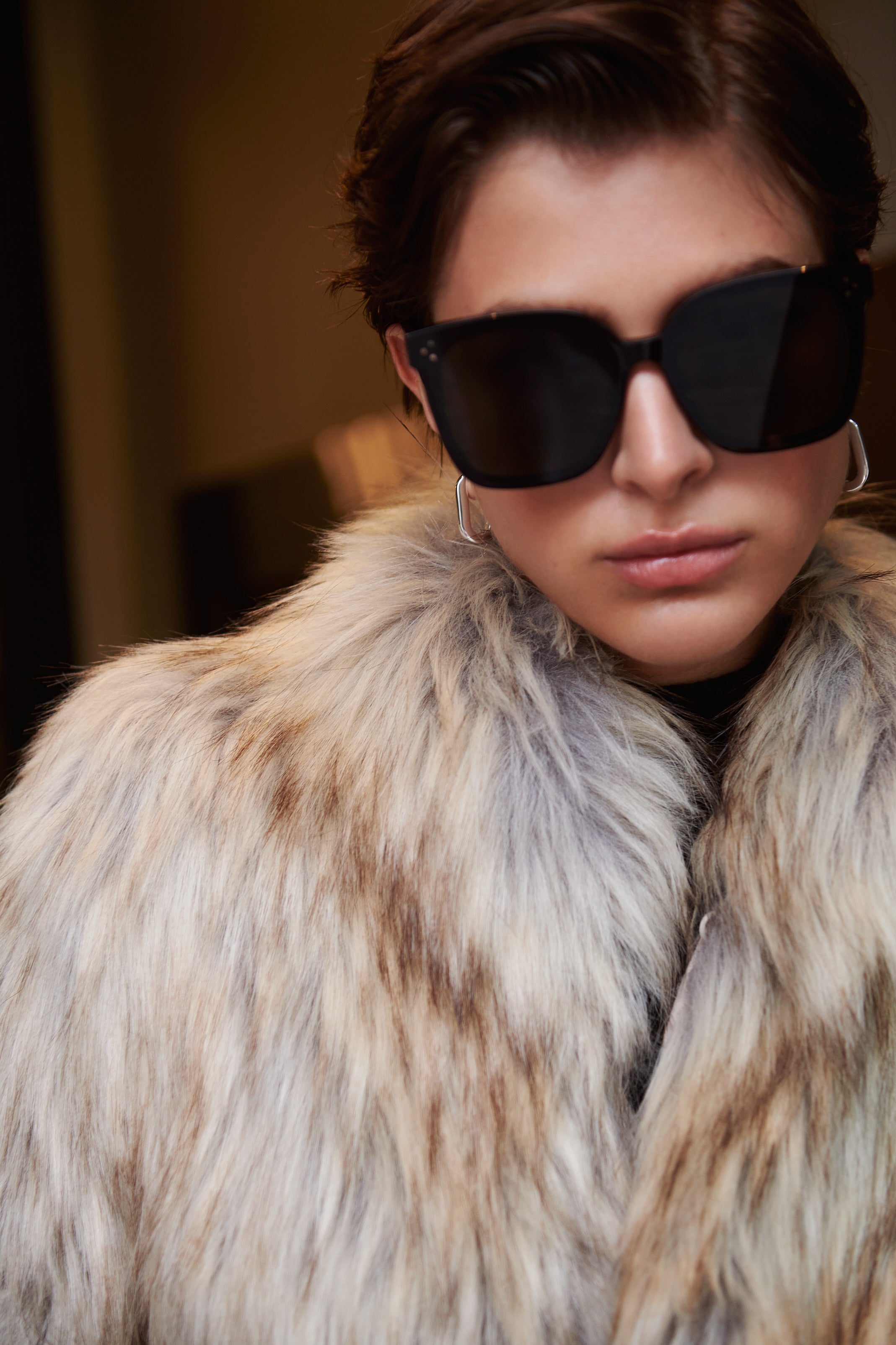 Faux Fur Coat by Unreal Fur accessorized with jenny bird Earrings