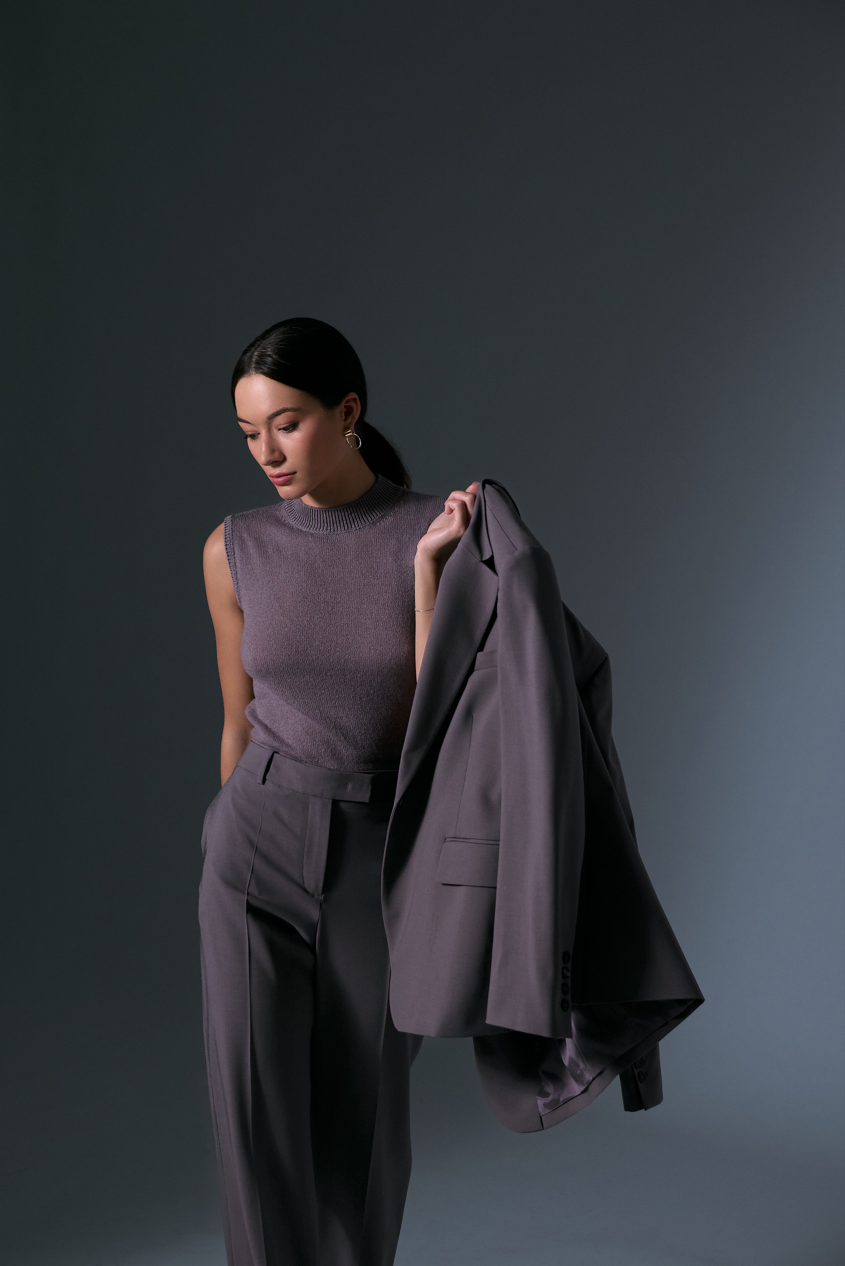 The Single-Breasted Wool Blazer, Straight-Leg Wool Trouser, and Crewneck Cashmere Sleeveless Sweater by Eleventy, styled with the Faye Knockers by Jenny Bird